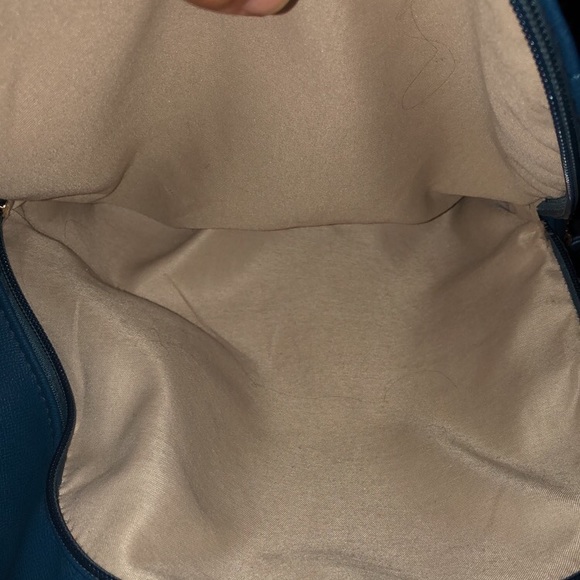 Blue bag no exactly sure the brand but it’s cute - Picture 5 of 6